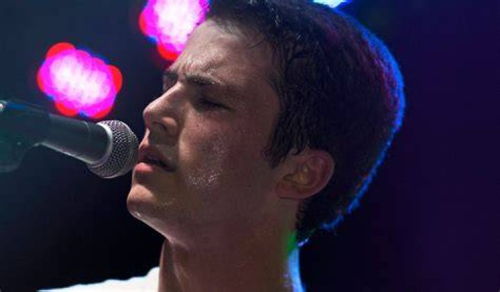 Minnette performing with his band, Wallows